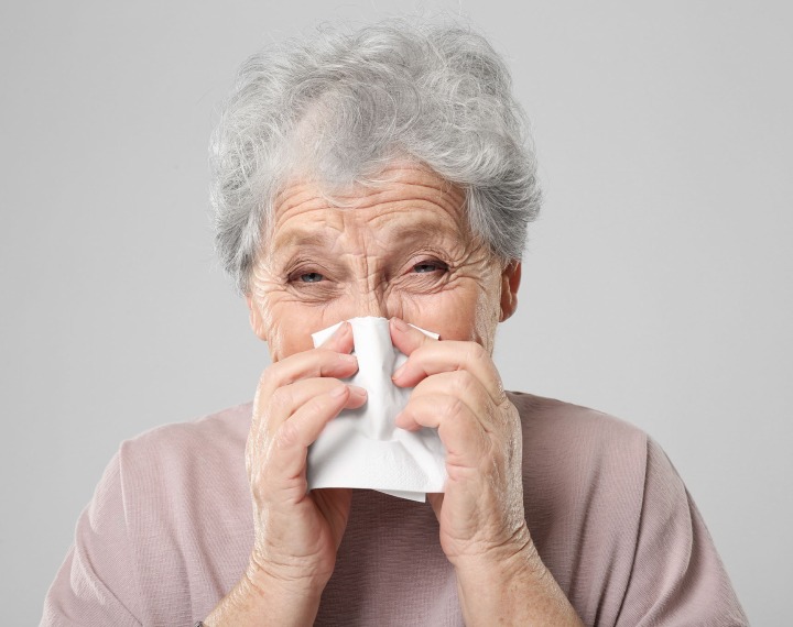 Senior woman with flu