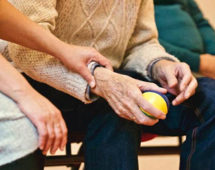 Carer helping senior