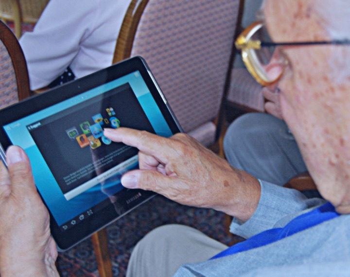 Elderly using tablet