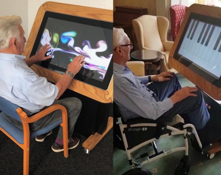 Interactive digital table being used by a senior
