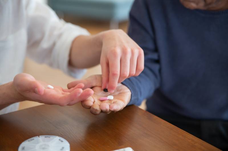 Carer with medication